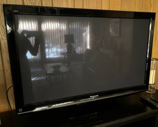 Panasonic TV.         27"h x 44"w