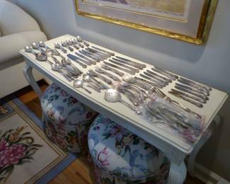 Gorham sterling silver flatware set, pair of round floral ottomans, French Country console table
