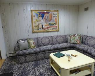 Sectional sofa, accent pillows, vintage coffee table, Antique framed French poster