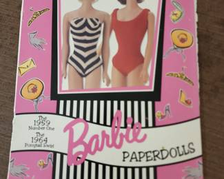 Paper dolls some are still in tact