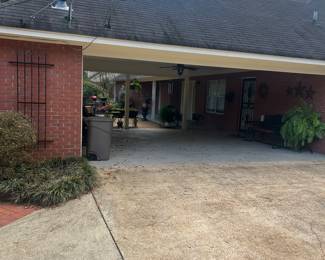 view of double carport and patio area
