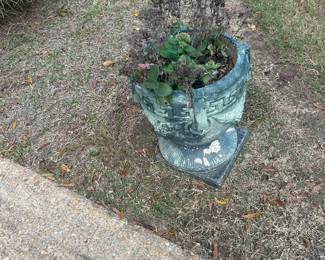 concrete yard planter with drapes and greek key design
