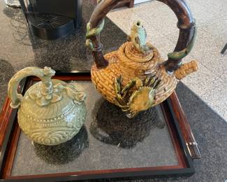 Brown ceramic tea pot with fish and crab, and green Asian inspired design on green one - Acrylic tray: SOLD