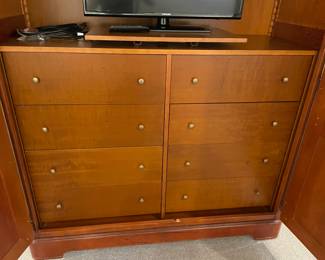 A view of the inside of Grange French Provencial armoire with 8 drawers and metal hardware - good condition - some wear in lower edge inside (77" x 36" x 32")