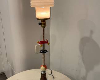 Art deco light with milk glass shade - "Racing" signed by Harry Anderson '94