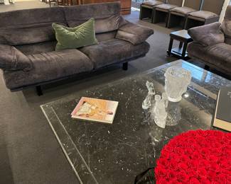Another view of the Italian custom upholstered seating: 1 loveseat by B. B. Alanda (back upper portions adjusts to resting position) with colored mohair pillow, black marble cocktail table (66" square x 17")