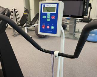 Another view of the Theracycle recumbent bike - provides full-body motorized assisted therapy - like new