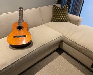 L-shaped sofa - (33" back height) by R. Jones - wool blend upholstery - good condition, MCM styled wool and silk backed pillows; and Fender Acoustic guitar