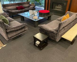 Italian custom upholstered seating: 2 couches and one loveseat by B. B. Alanda (back upper portions adjusts to resting position) with 3 mohair pillows. Shown with Pair of Italian Ebonized side tables by Cassina - after Frank Lloyd Wright, black marble cocktail table (66" square x 17"), and stone and wood bench by Christian Liagre and Holly Hunt