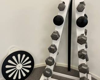 Dumbbell hand weights with white metal rack - good condition - some wear (pairs of 25 lbs, 20 lbs, 15 lbs. 10lbs, 8 lbs, 5 lbs)