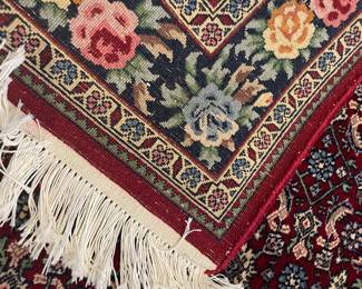 Another view of the back of the Kashan Style 100% wool rug - (5' x 3")hand-made w hand-tied fringe - Center medallion with triple boarders - excellent condition