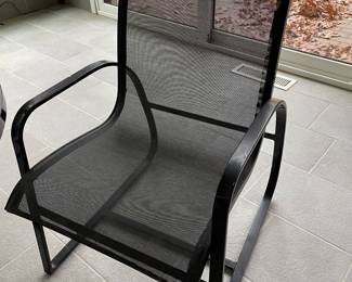 Another view of the patio armchairs - black metal and mesh- excellent condition - 8 available