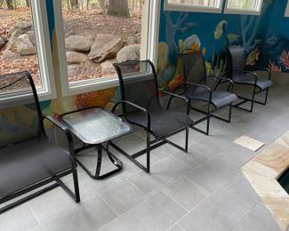 patio armchairs - black metal and mesh- excellent condition (8 available) and shown with another side table