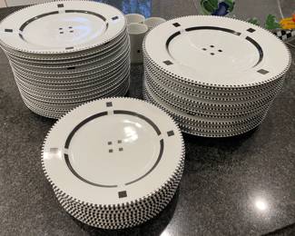 Swid Powell Dinnerware - "Tuxedo" pattern. Designed by Charles Gwathmey and Robert Siegal (11 chargers, 12 dinner plates, 7 salad plates, and 3 coffee cups) - SOLD: 5 dinner plates and 2 salad plates
