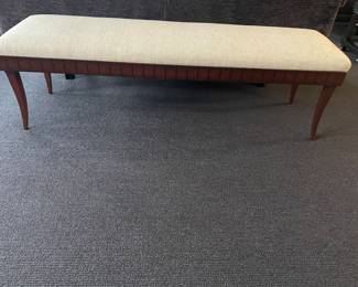 Full view of the Art Deco-styled bench - padded seat- raised on saber legs (18" x 60" x 16") - excellent condition - Newly re-upholstered