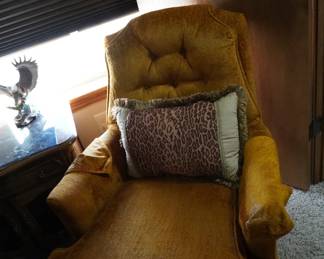 gold chair and pillow