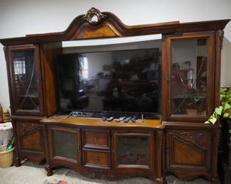 Large entertainment center, TV, sound bar