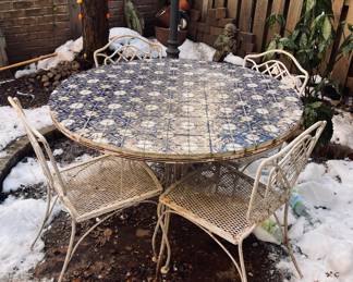 Outdoor wrought iron table and chairs