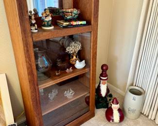 Sweet antique curio cabinet is 25.5" wide x 11" deep x 54" tall. Hummels and an old Weller piece of pottery. Western Stoneware crock 2