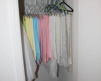 lots of vintage tablecloths and other linens