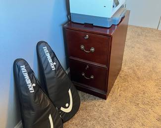 Bombay Co. filing cabinet, HP inkjet printer, Head tennis racquets