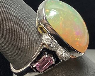 PLATINUM OPAL, SAPPHIRE, & DIAMOND RING, SIZE 7, 8.86cts OPAL, 0.76cts SAPPHIRE, 0.13cts DIAMONDS, 8.8g TOTAL WEIGHT, GGA APPRAISAL $10,630.00