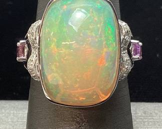 PLATINUM OPAL, SAPPHIRE, & DIAMOND RING, SIZE 7, 8.86cts OPAL, 0.76cts SAPPHIRE, 0.13cts DIAMONDS, 8.8g TOTAL WEIGHT, GGA APPRAISAL $10,630.00