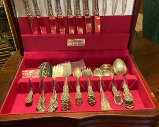 There’s a set of stainless utensils and a separate set of sterling silver utensils.