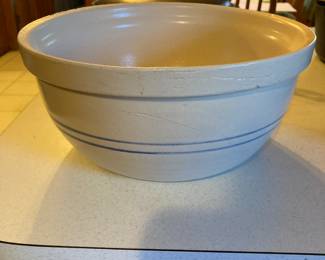 The kitchen is full of pieces like this and other pieces of pottery.