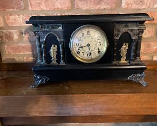 Here is another antique clock which sits on the mantle in the den.I’m 