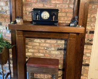 There is a fascinating fireplace mantle for sale and an old gas stove, which works great.