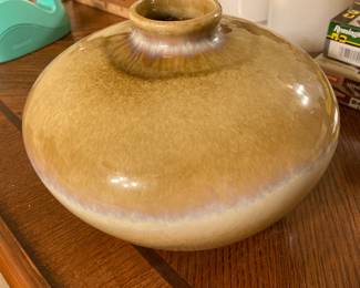 There are several pieces of pottery for sale here.