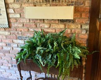 This is a beautifully carved wooden piece in the den.