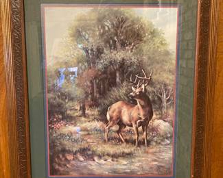 One of several framed pieces of art that’s for sale.