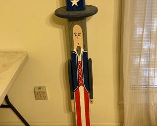There are several Fourth of July decorations for sale.