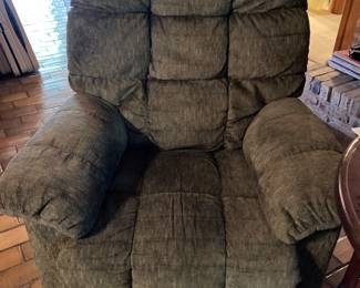 This chair is so comfortable and is sitting in the den.