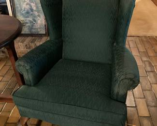 We have two green wingback chairs in the sale.