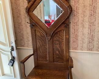 This wonderful piece sits in the entry hall of the home.