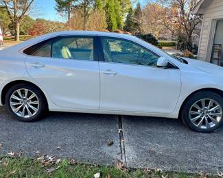 2017 Toyota Camry XLE with FWD, heated leather seats, sunroof, XM radio and less than 15K miles