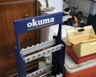 Fishing rod stand and coolers.