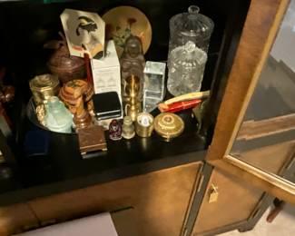 Items in China cabinet in living room 