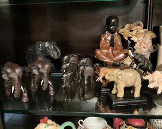 More items in China Cabinet in living room love all the elephants 