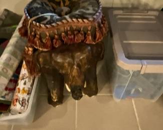 Caved wooden elephant with riding cushion on top - Sunroom 