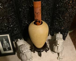 Additional items in front of ornate black screen