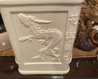 This Roseville - Closeup of some of the items on cabinet just inside front door 