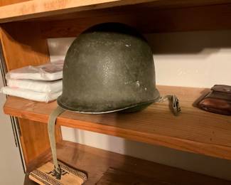 Vintage helmet in shelves
