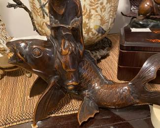 Closeup of some of the items on cabinet just inside front door 