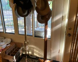 Two hat racks (vintage) with great hats!