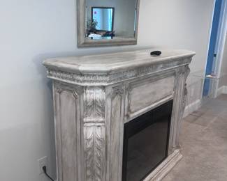 Faux working fireplace / heat and lite