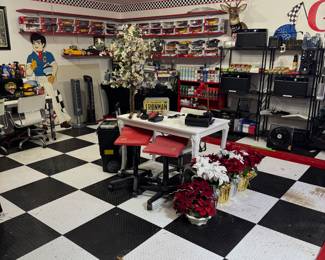 Packed garage with tools, cast iron collectible vehicles, Harley Davidson, authentic motorcycle parts, Pest control solutions, and so much more!